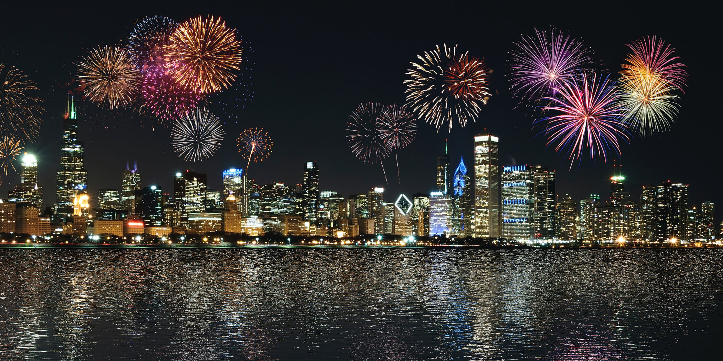 Image of fireworks over city skyline