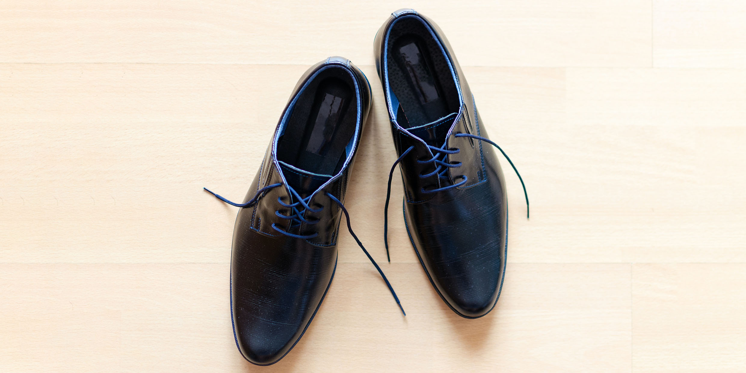 Image of pair of shoes with untied laces