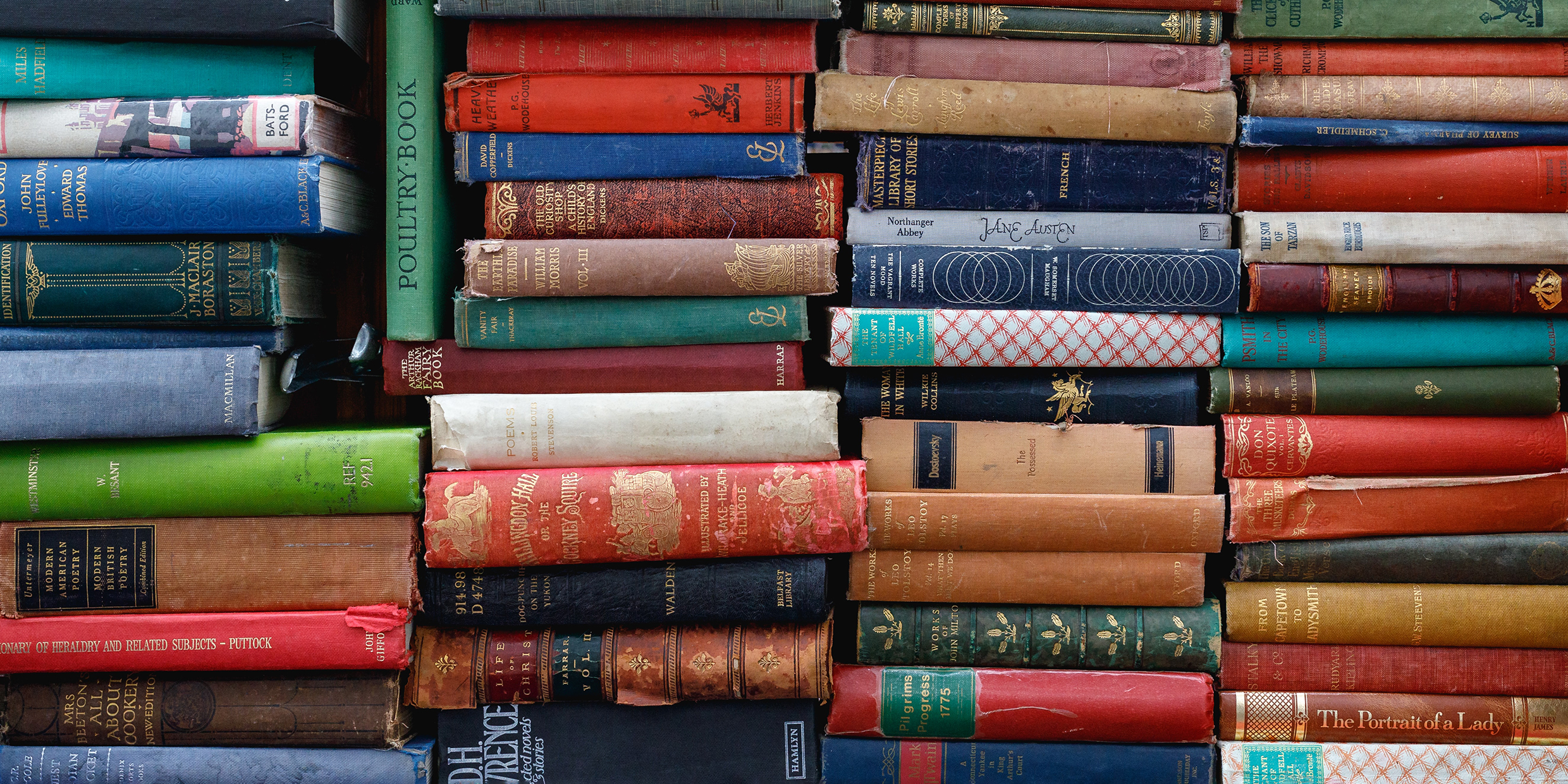 Image of stacks of old hardbound books