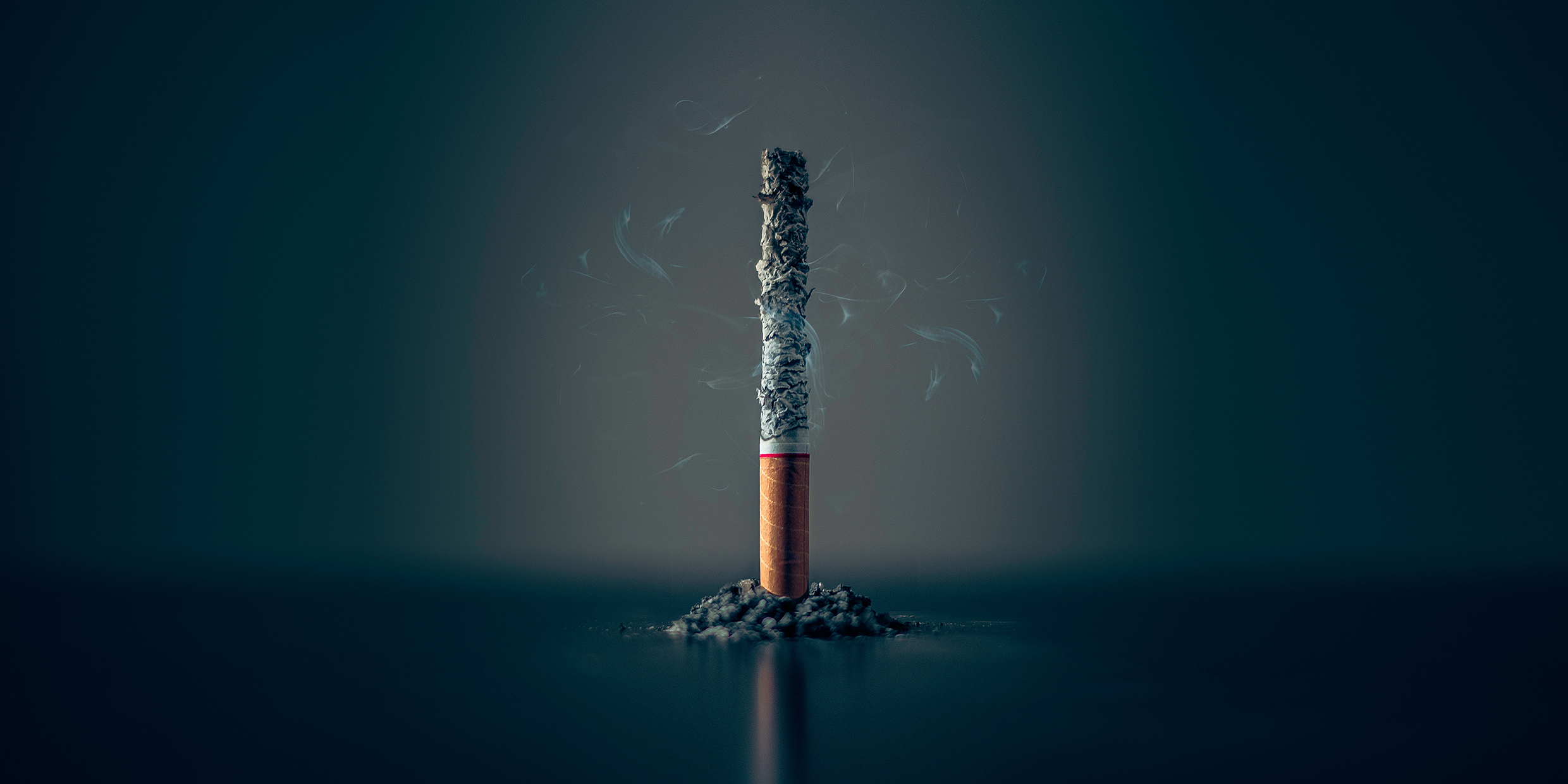 Image of a cigarette which has burned mostly to ash