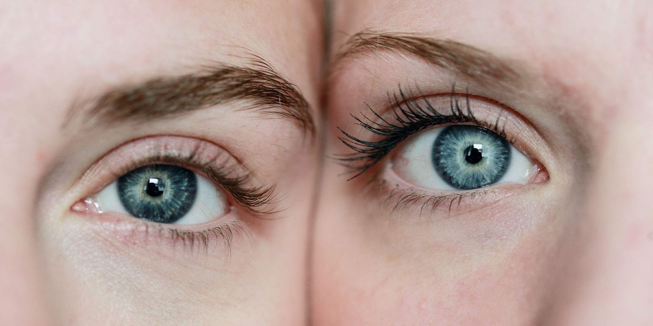 Close up image of the eyes of two similar-looking women